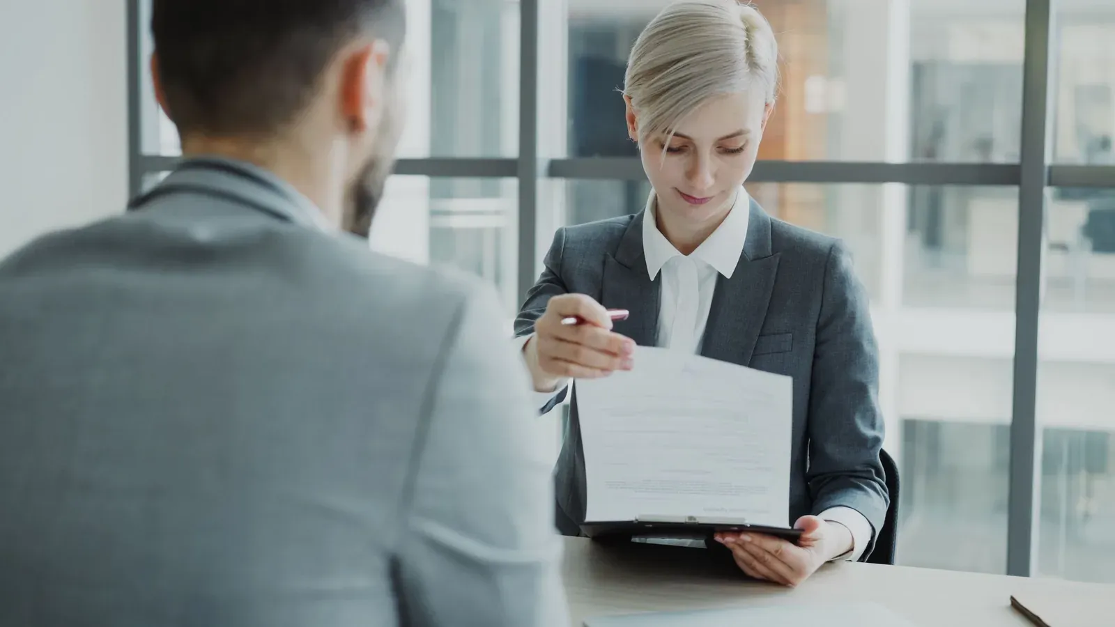 A founder comparing three proposals against one brief