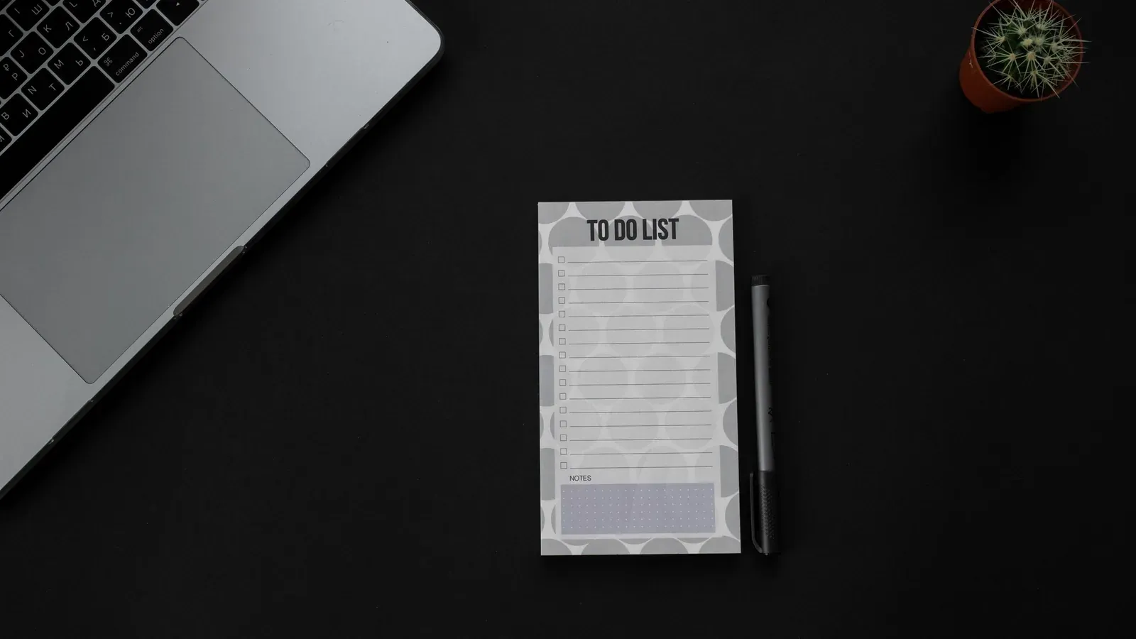 A checklist beside a ticket card under a magnifying glass